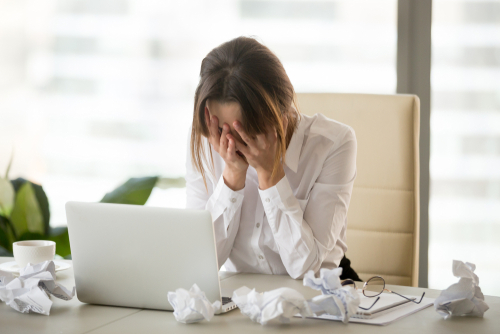 Stressed person at desk